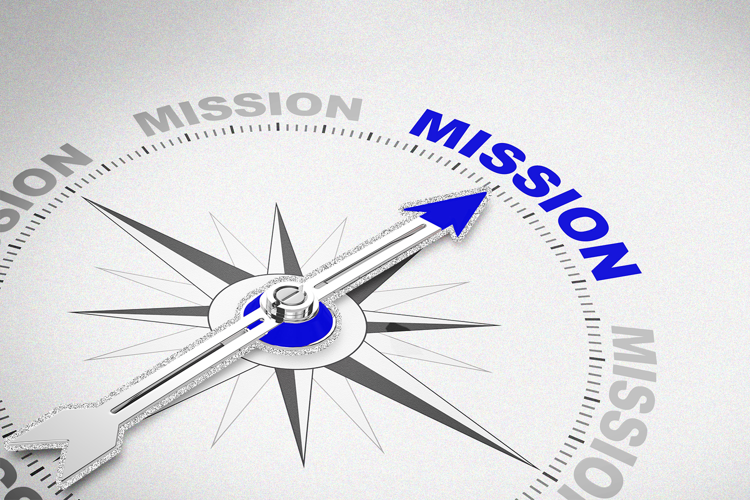 A compass with an arrow pointing to the word "mission"