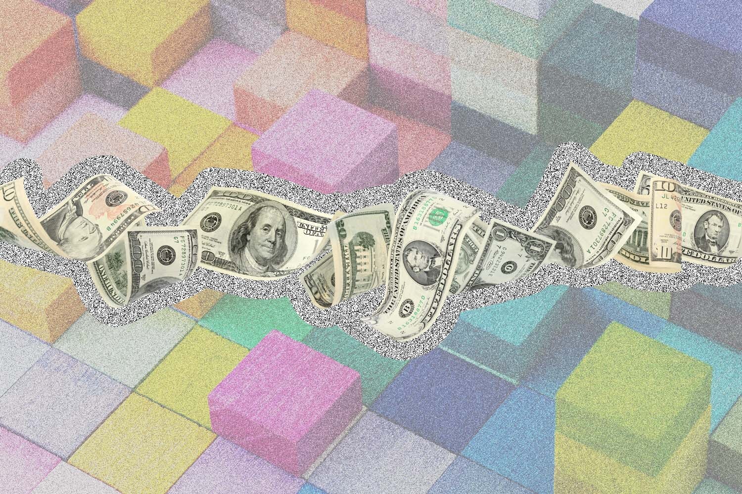 Money over rainbow blocks