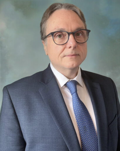 man in suit with glasses
