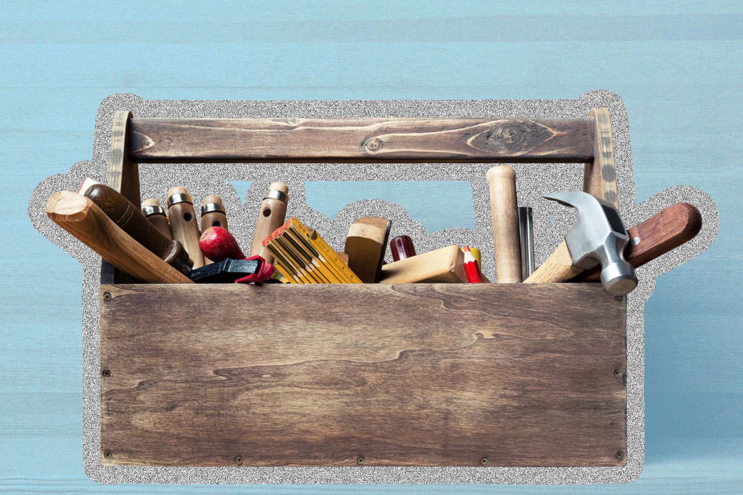 wooden toolbox filled with different tools