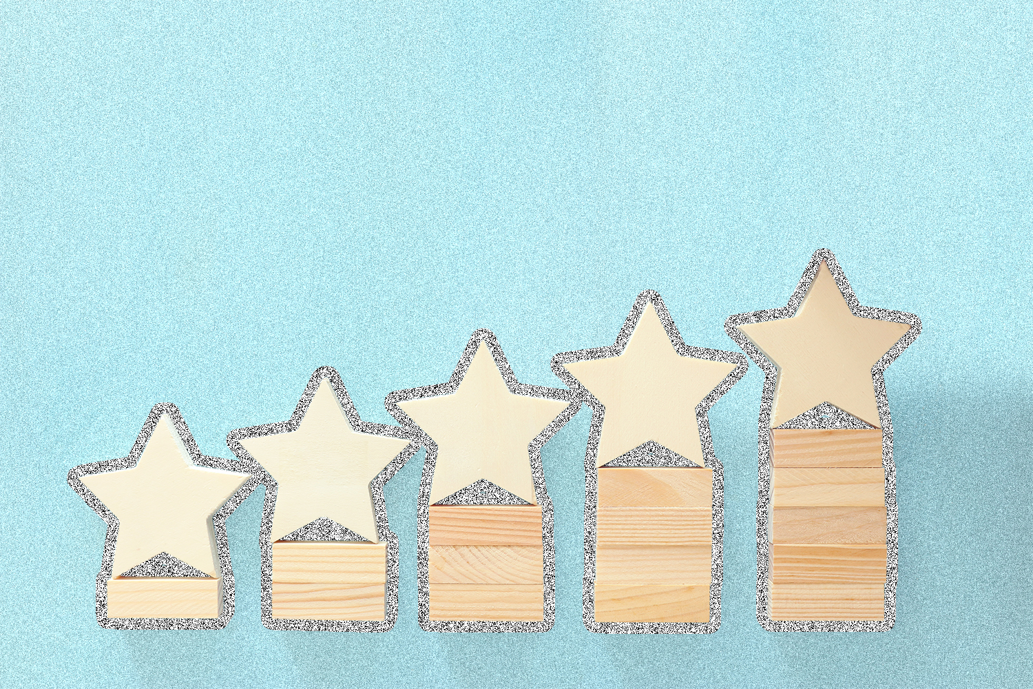 Image of 5 wooden stars on wooden blocks