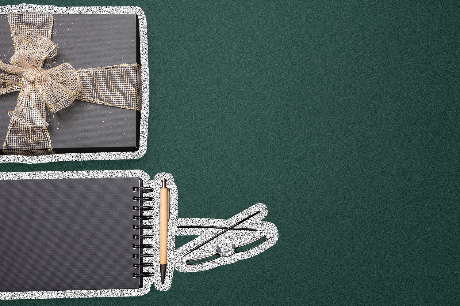 A notebook, pen, gift, and glasses against a dark green background