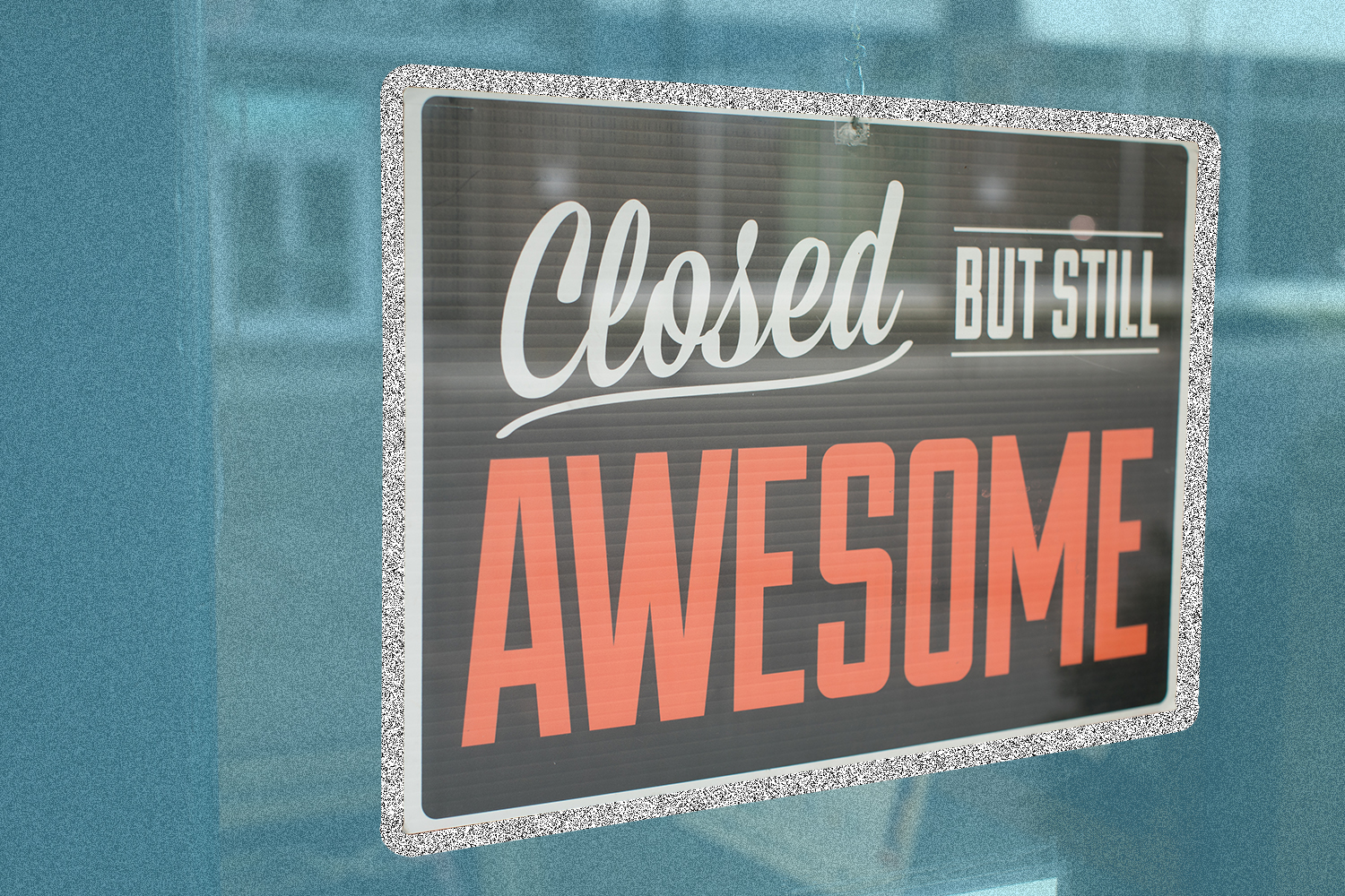 image of storefront with sign posted that says, "Closed but still awesome"