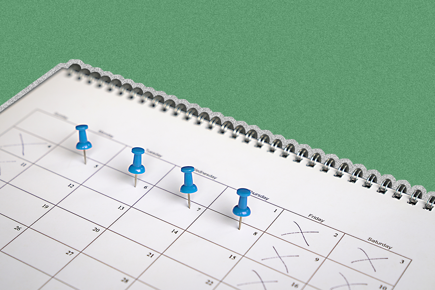 A calendar page with four thumbtacks marking Monday-Thursday and Friday-Sunday each marked with an X.