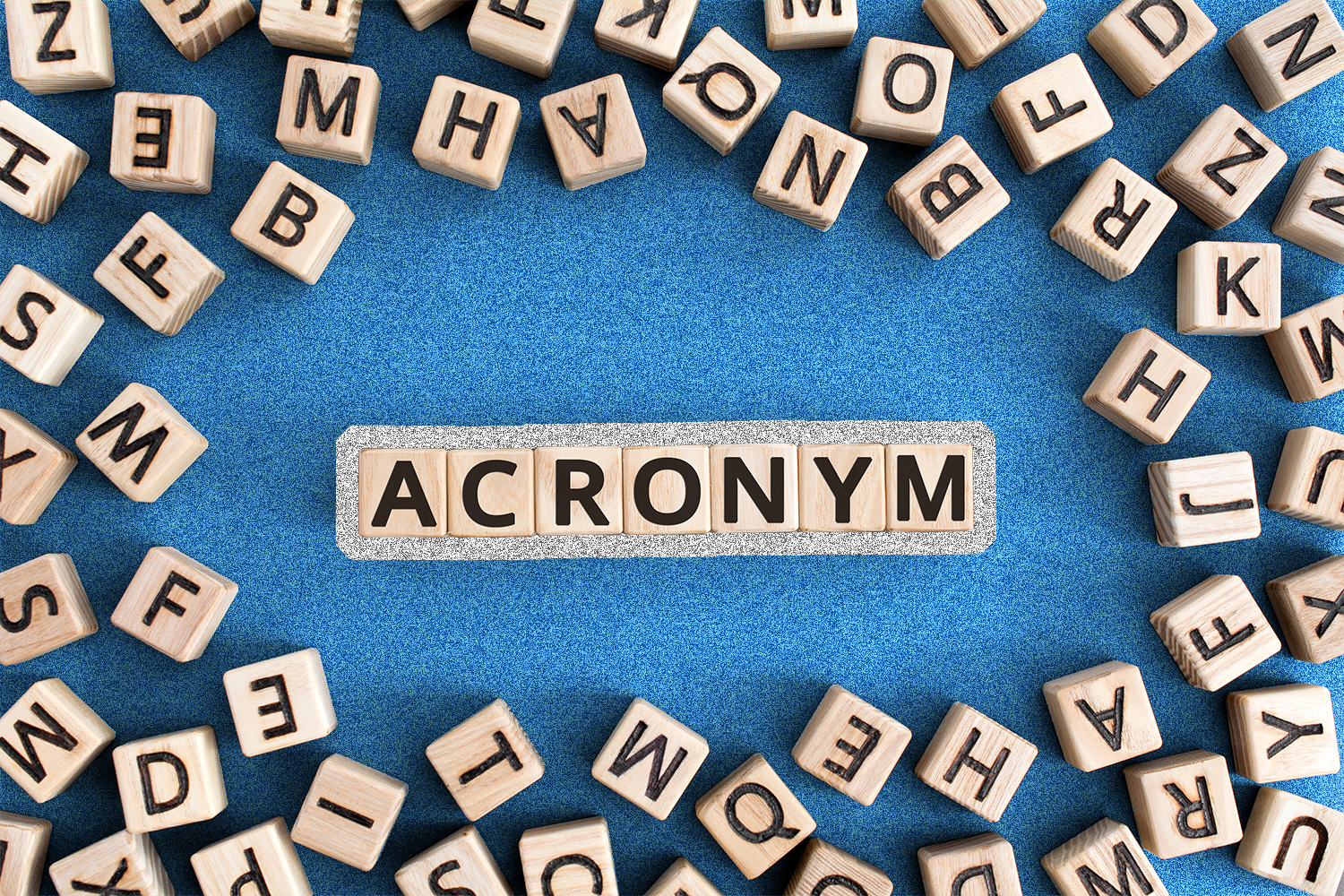 Letter blocks that spell out the word "acronym"