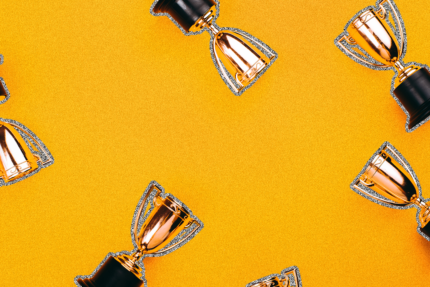 An orange background with gold trophies.