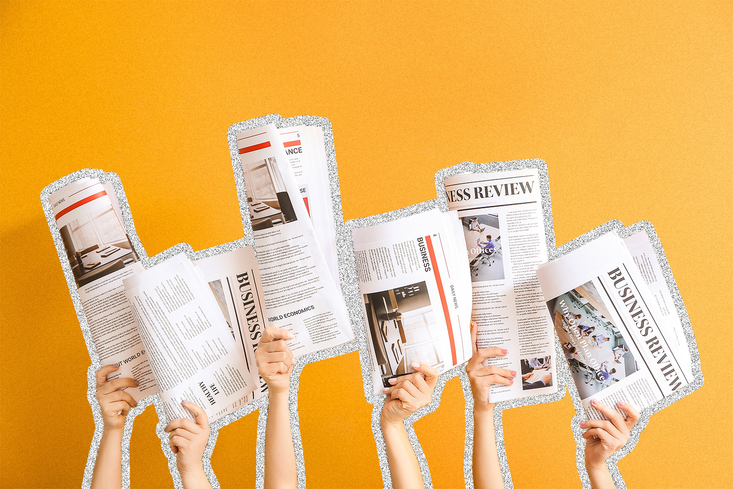 hands holding up newspapers