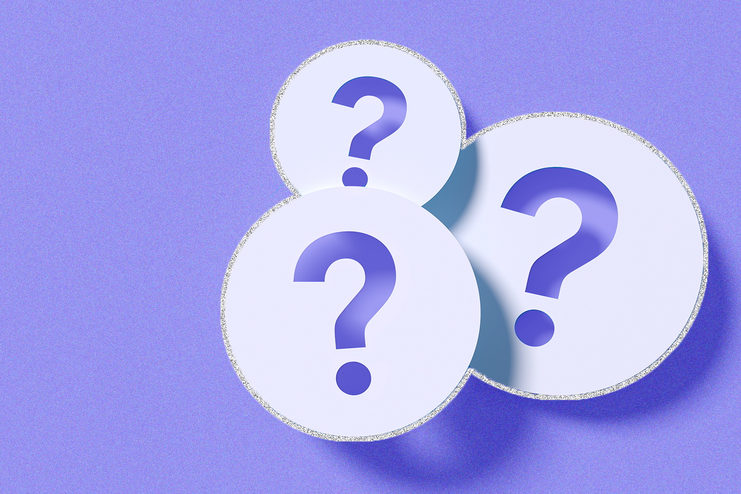 Three round white shapes each with a question mark in them, on a purple background
